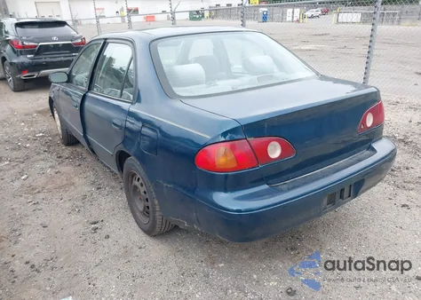 2002 Toyota Corolla Le из США, поврежденный, VIN 2T1BR12E82C545451